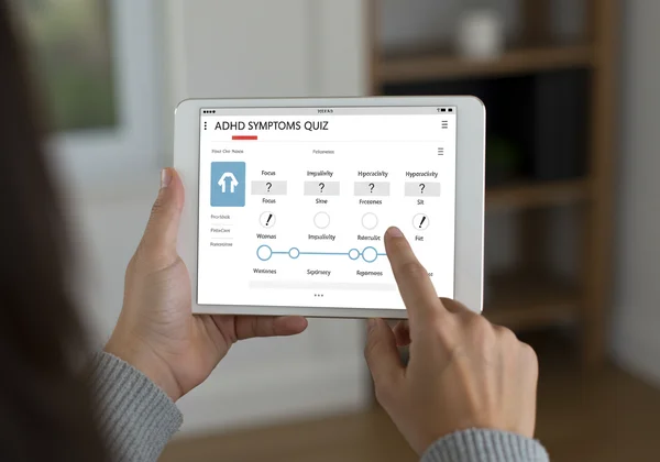 User taking an ADHD online screening quiz on a tablet